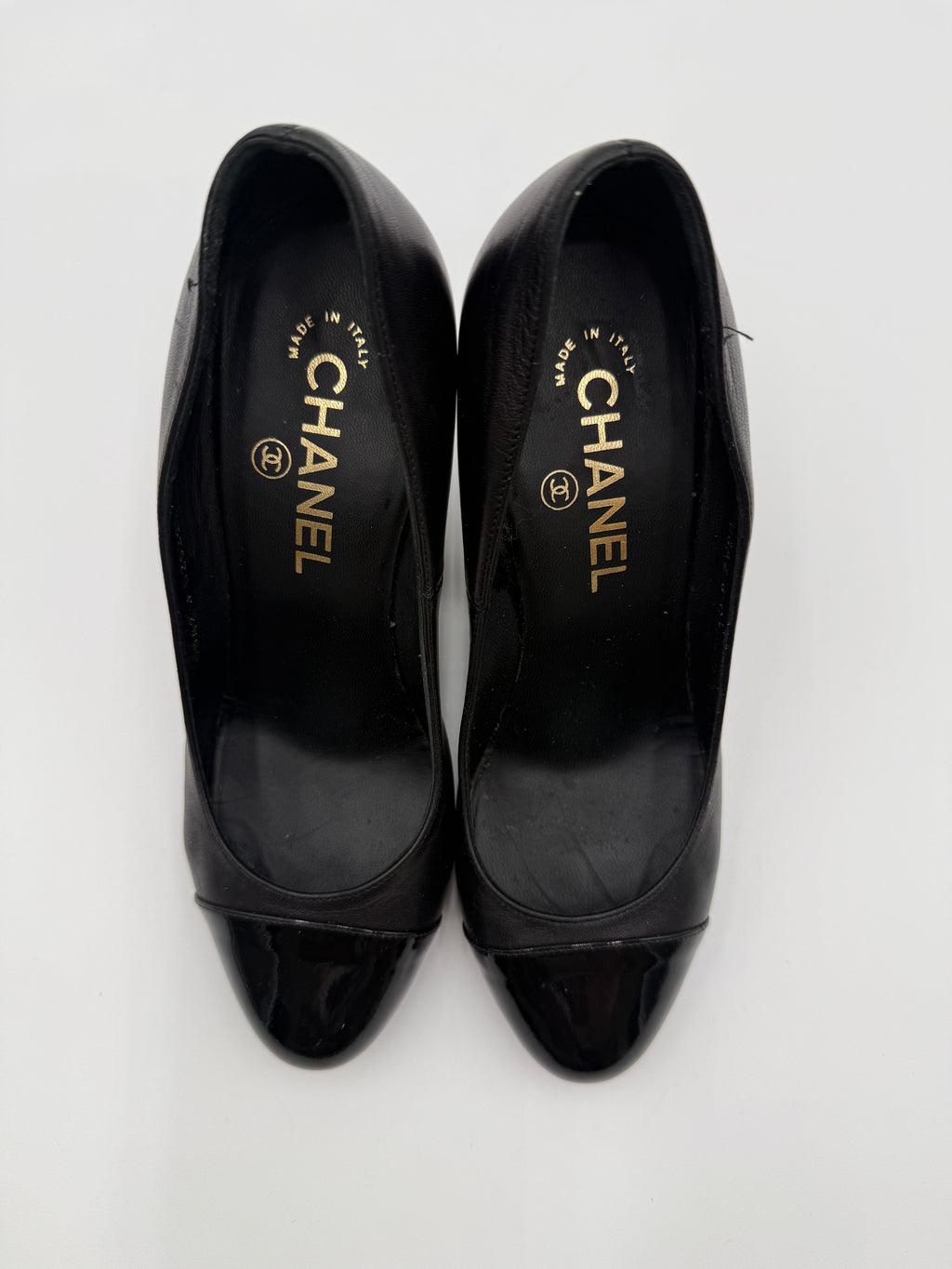 Chanel Black Leather and Patent Leather Cap-Toe Pumps