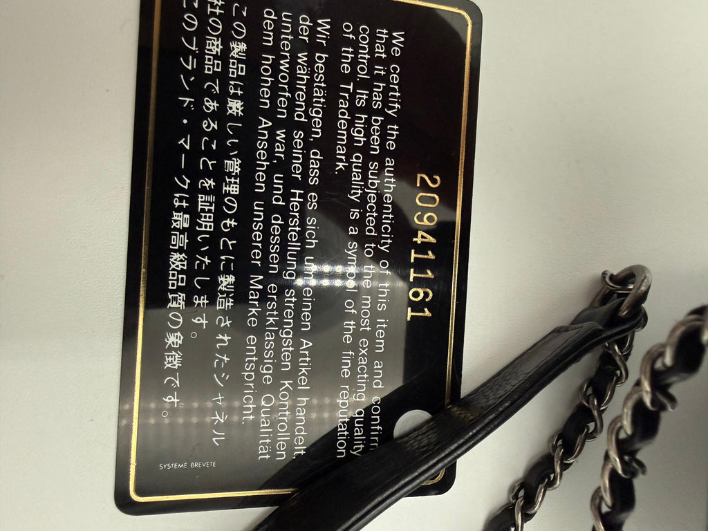 Chanel vintage black leather phone holder