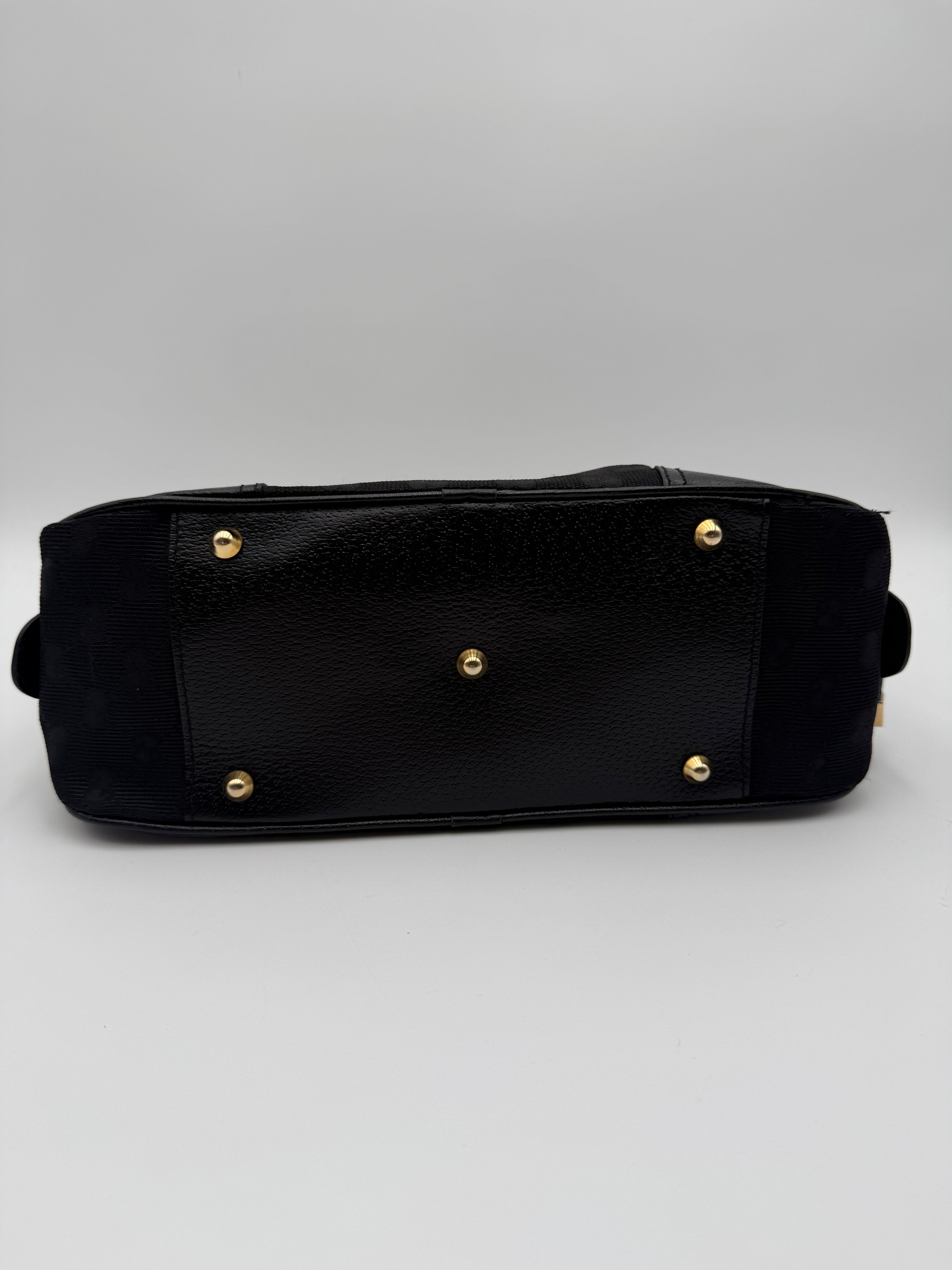 Gucci Princy Boston in tela GG Monogramma nera con finiture in Pelle