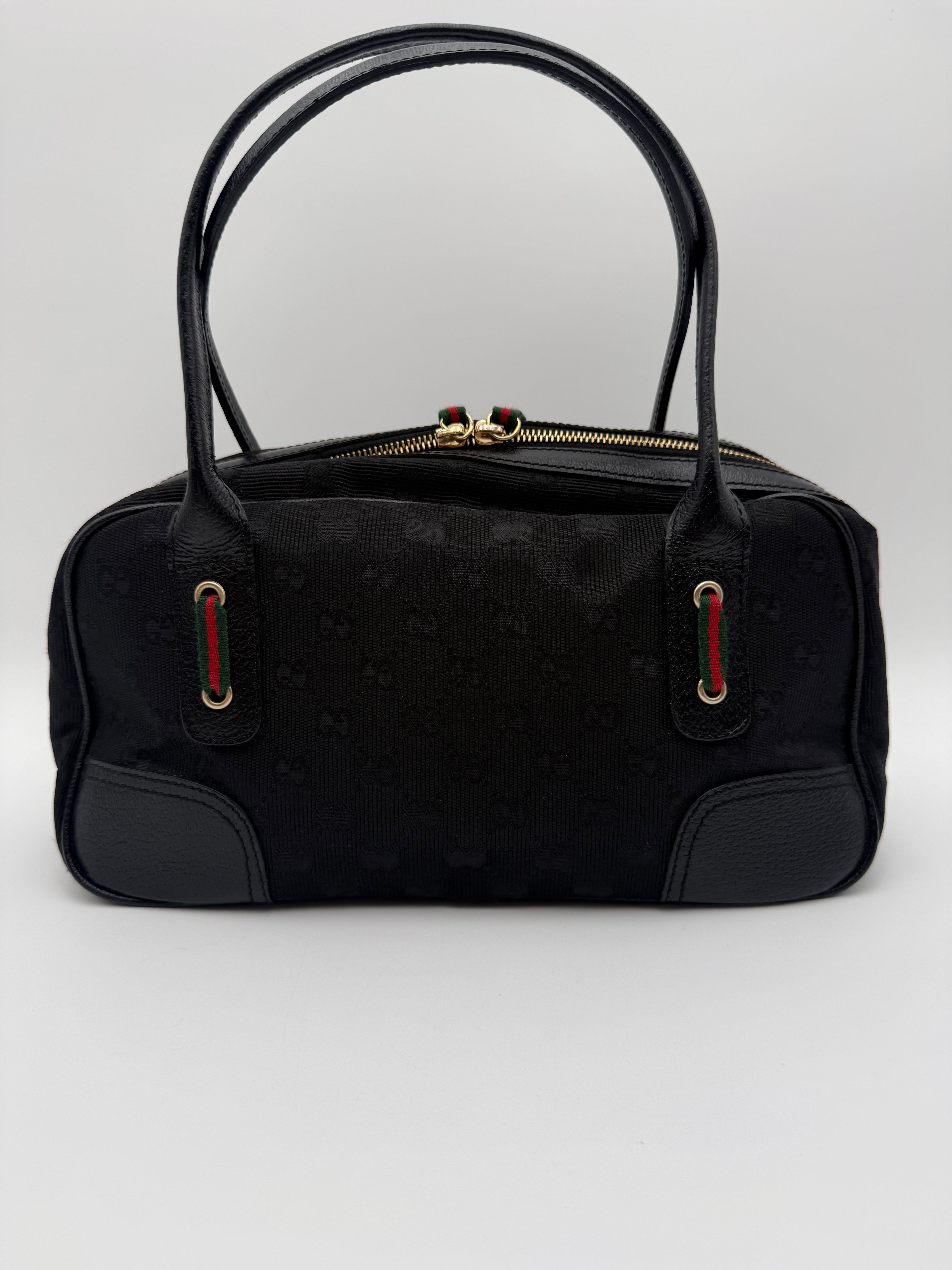 Gucci Princy Boston in tela GG Monogramma nera con finiture in Pelle