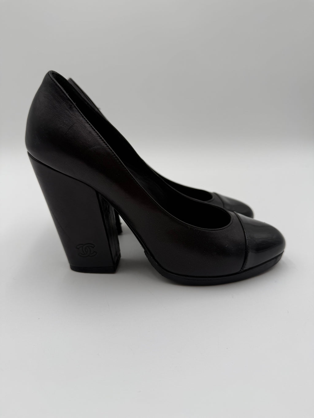 Chanel Black Leather and Patent Leather Cap-Toe Pumps