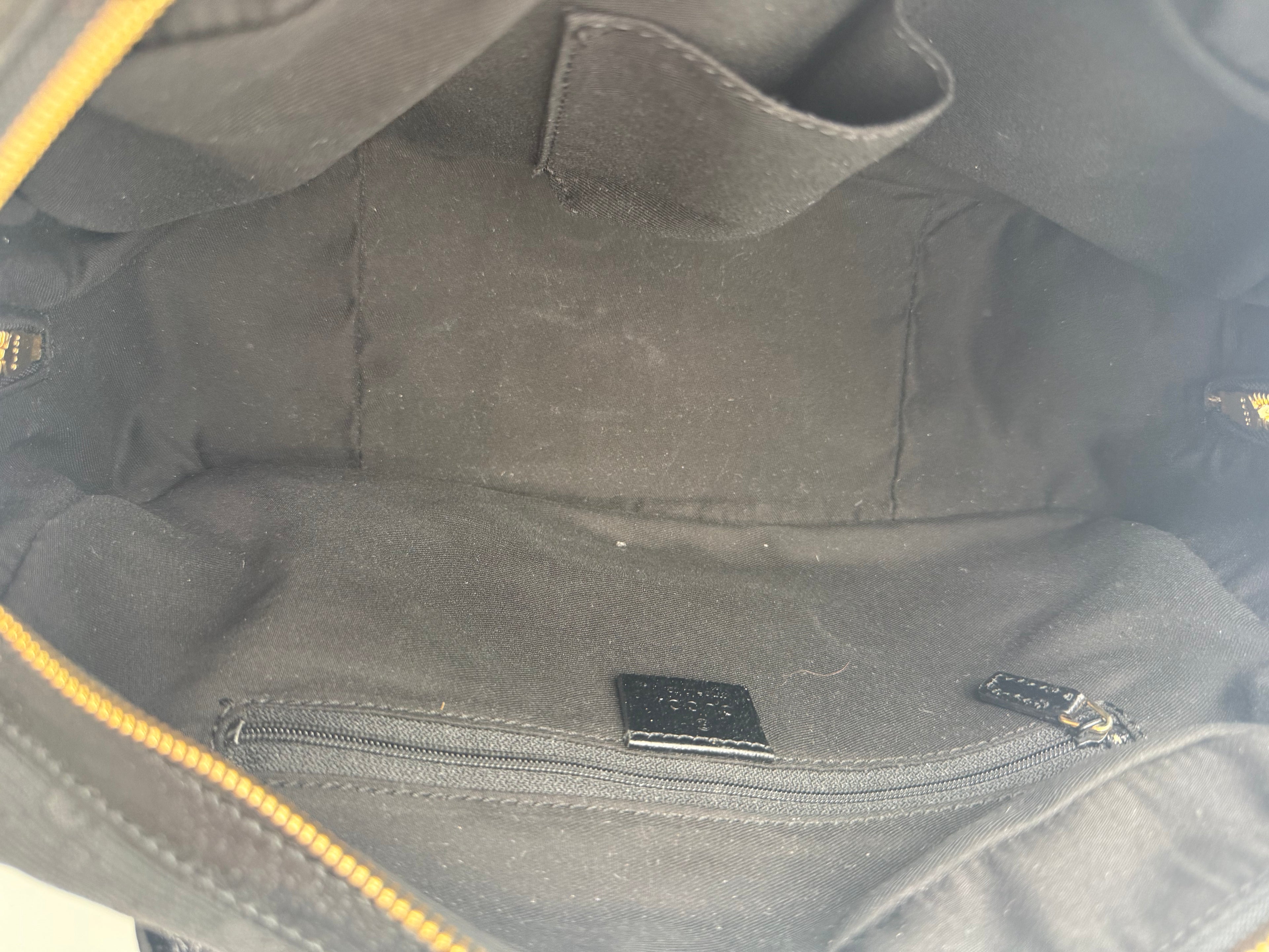 Gucci Princy Boston in tela GG Monogramma nera con finiture in Pelle