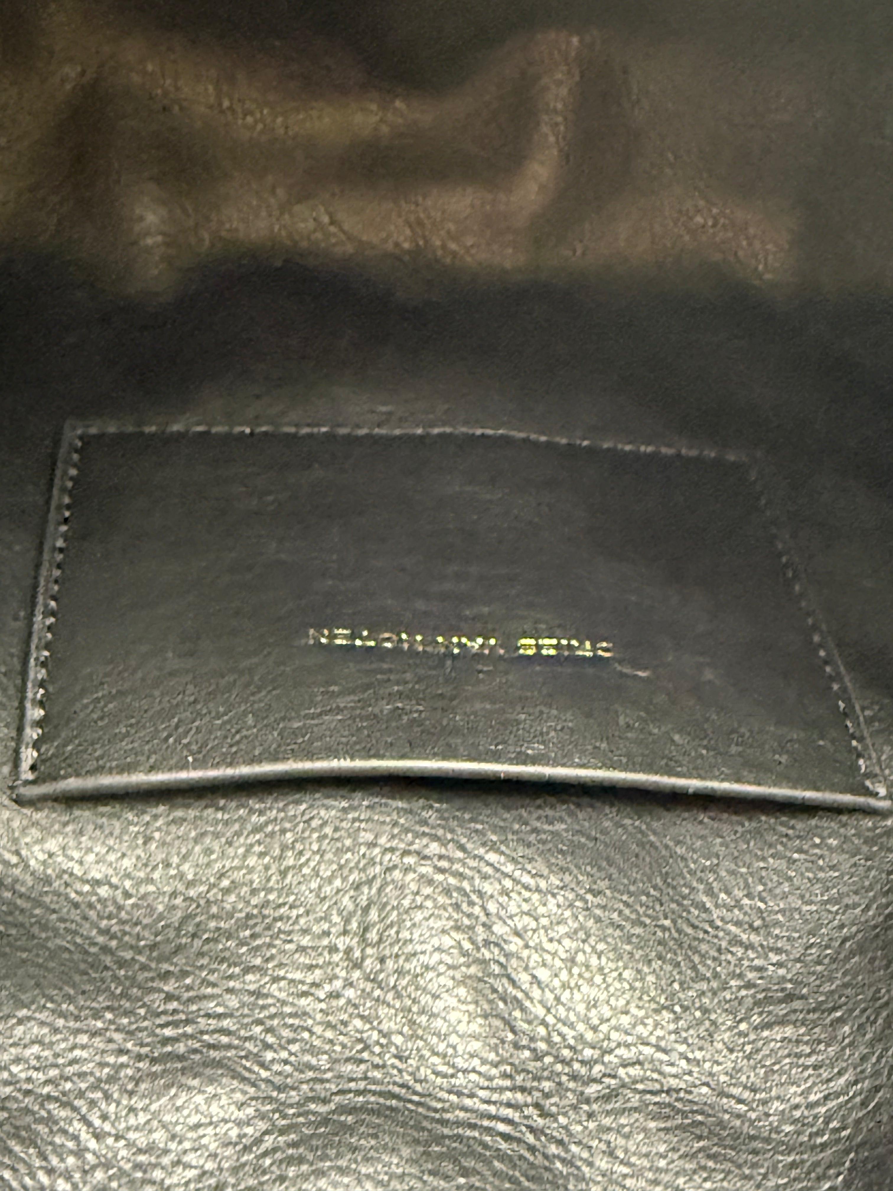 Dries Van Noten Pochette in Tessuto Tecnico Plissettato Nero - Mercatino di Ninni