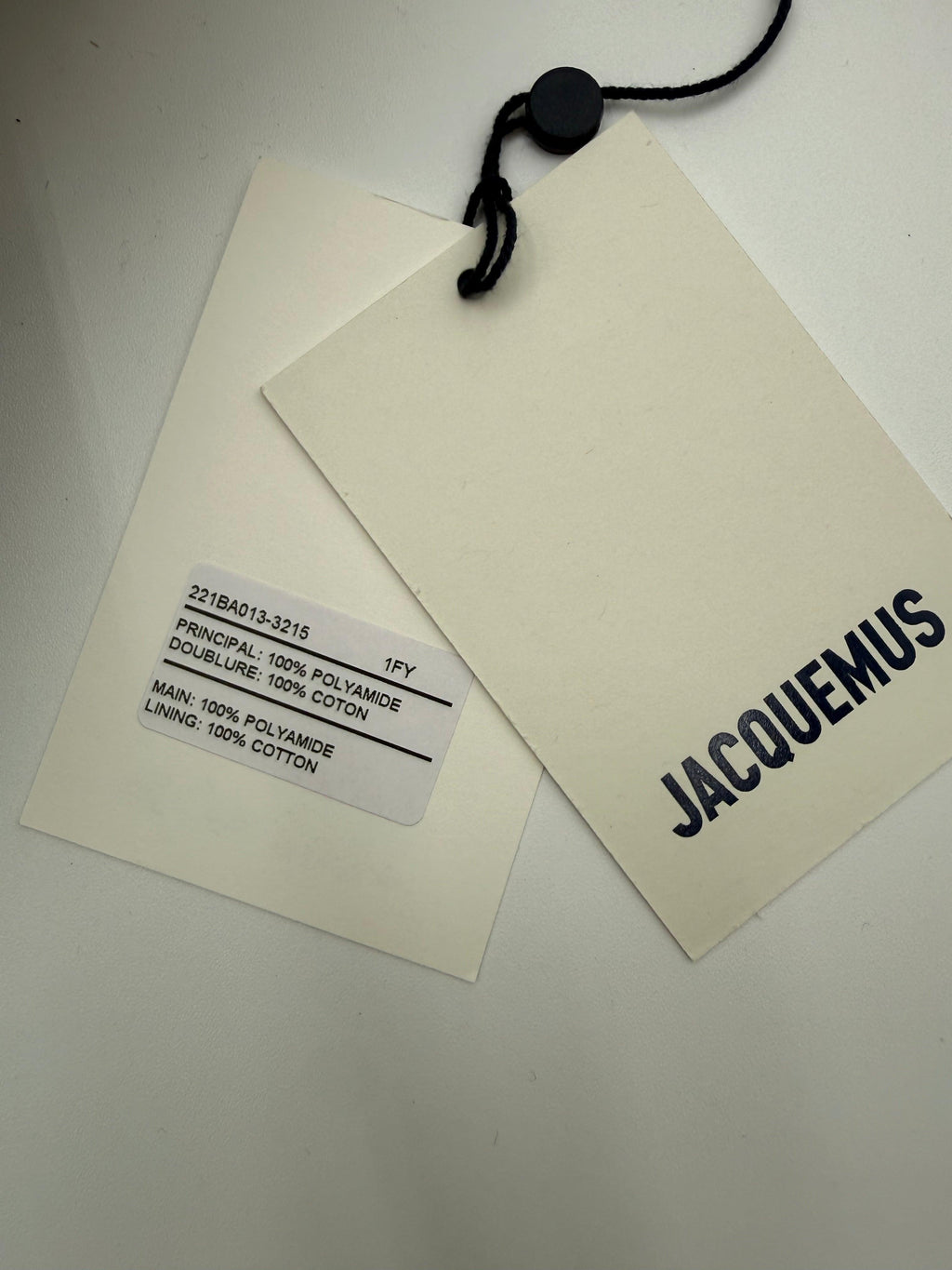 Jacquemus Borsa Le Bambino Long in Rafia Intrecciata Beige e Pelle Nera - Mercatino di Ninni