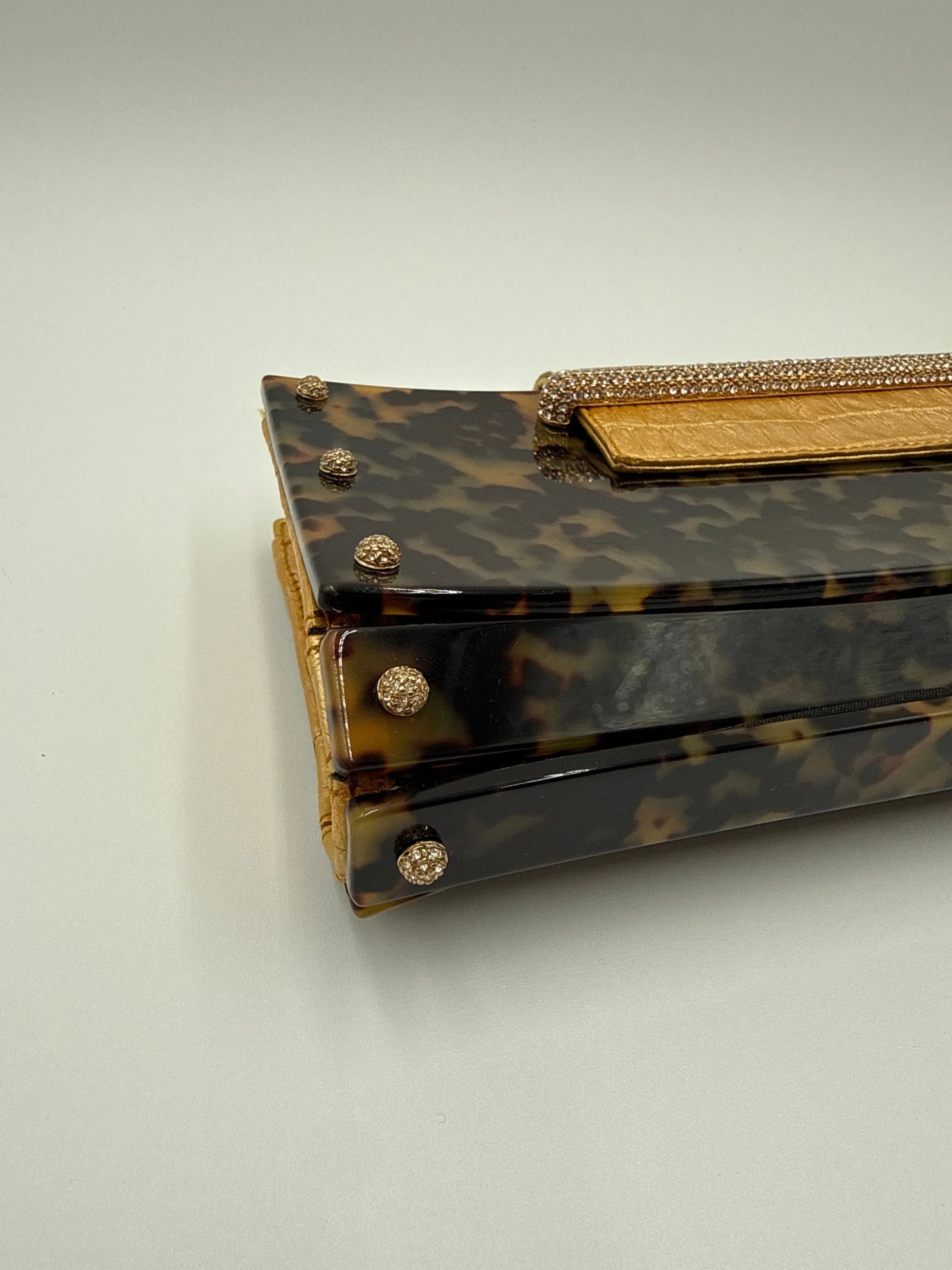 Valentino Garavani Pochette in finitura a Guscio Tartaruga Marrone - Mercatino di Ninni