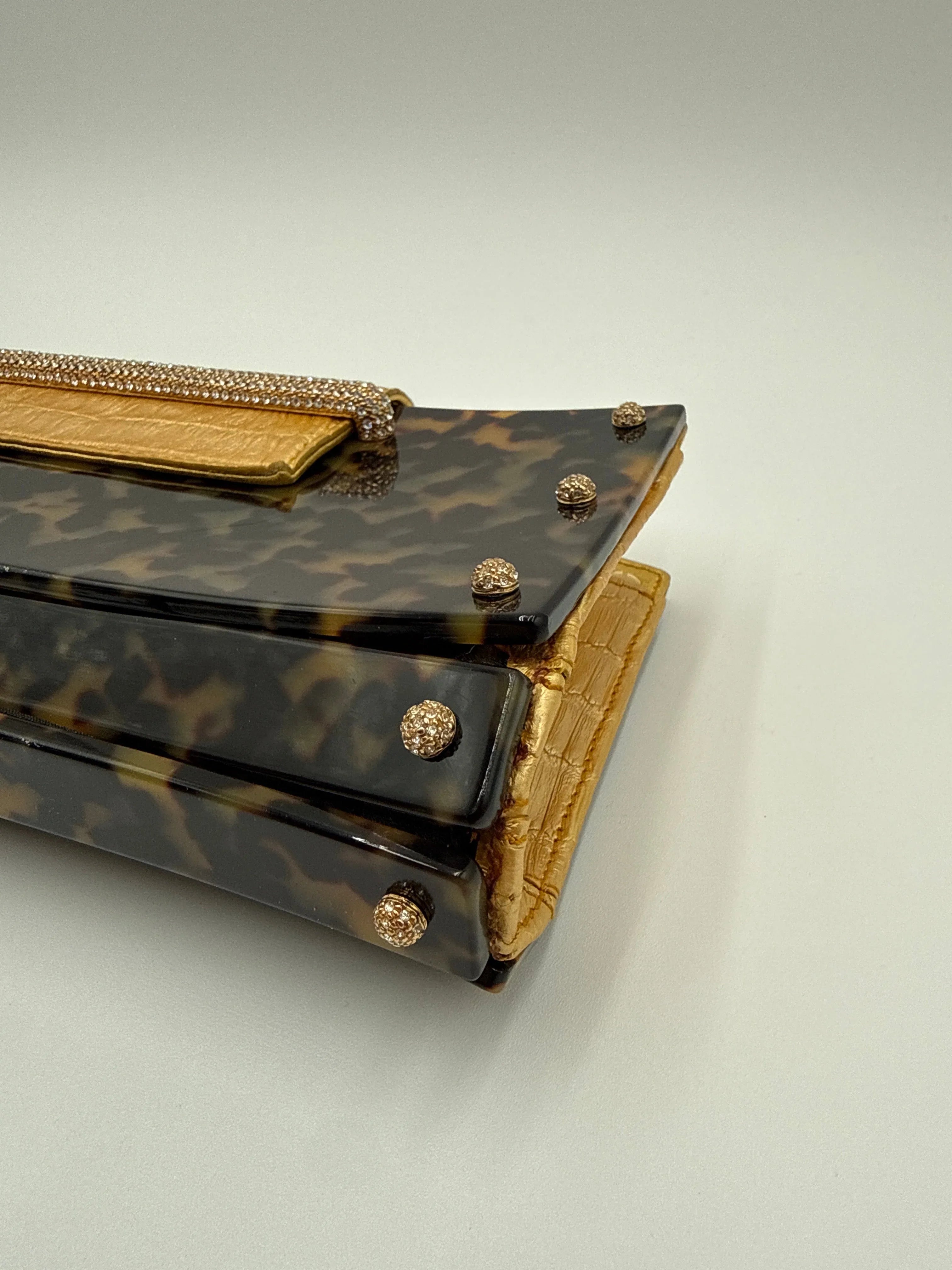 Valentino Garavani Pochette in finitura a Guscio Tartaruga Marrone - Mercatino di Ninni