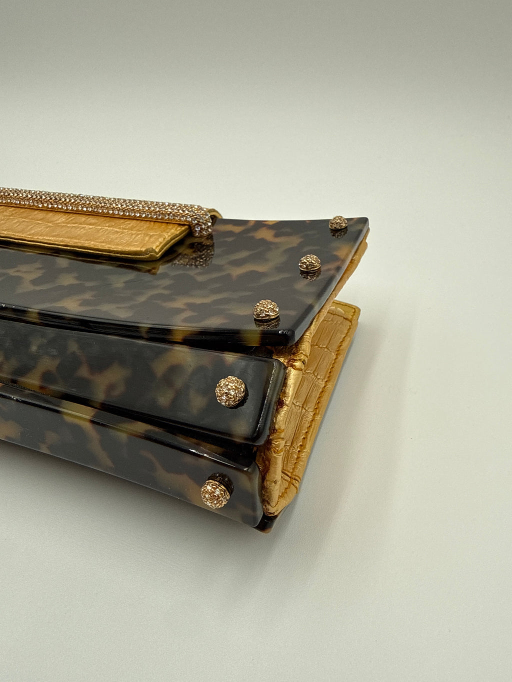 Valentino Garavani Pochette  in finitura a Guscio di "Tartaruga" Valentino Garavani