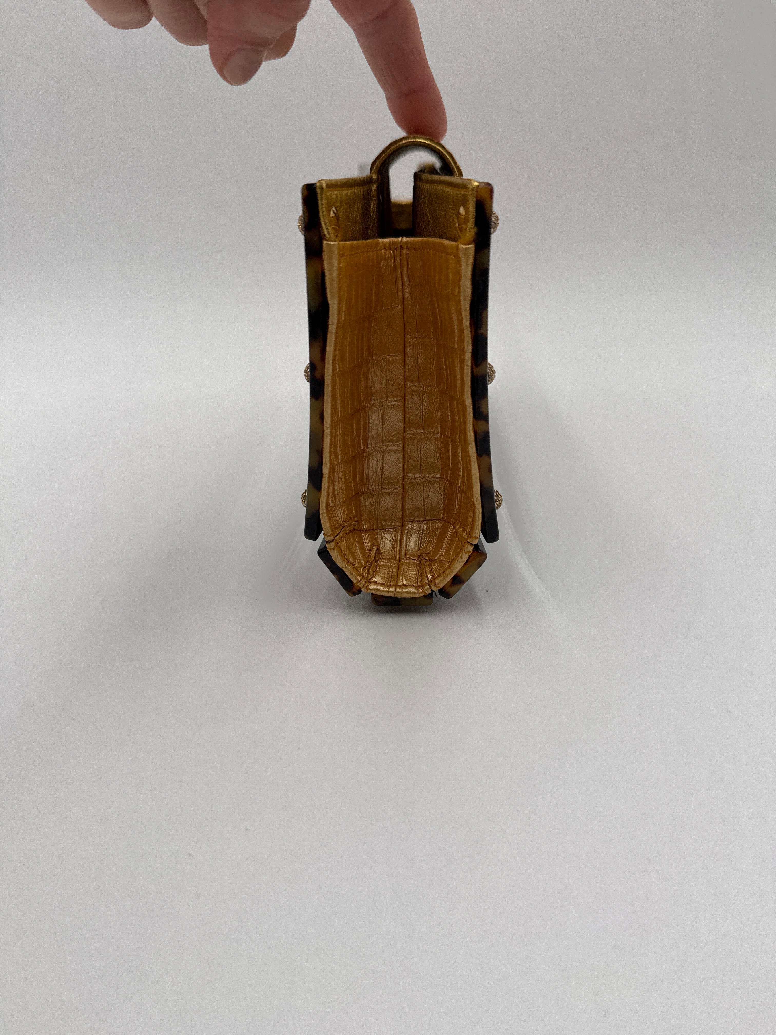 Valentino Garavani Pochette  in finitura a Guscio di "Tartaruga" Valentino Garavani