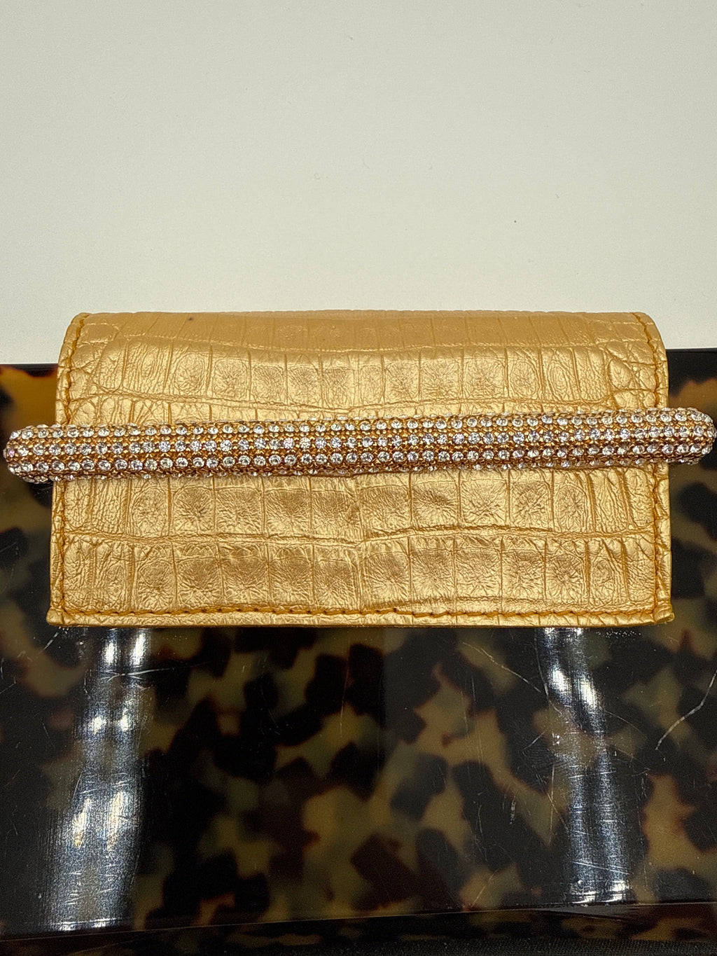 Valentino Garavani Pochette  in finitura a Guscio di "Tartaruga" Valentino Garavani