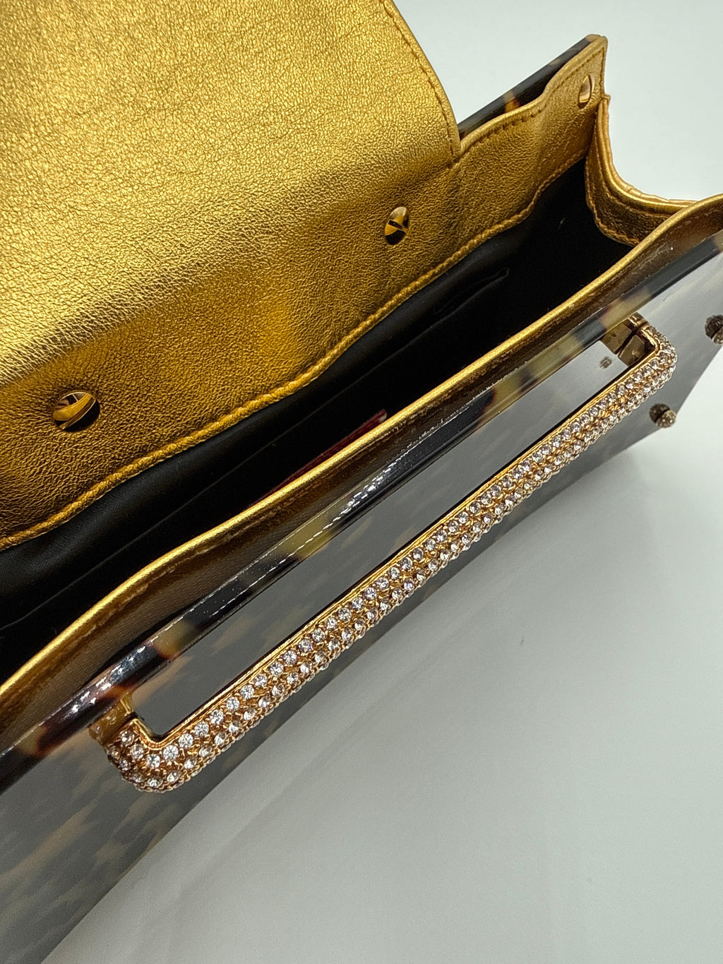 Valentino Garavani Pochette  in finitura a Guscio di "Tartaruga" Valentino Garavani